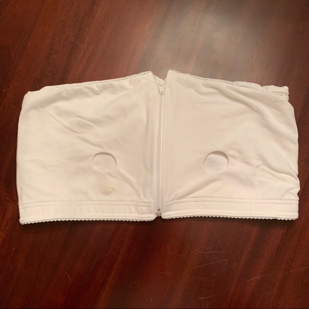 White Medela pumping bra.